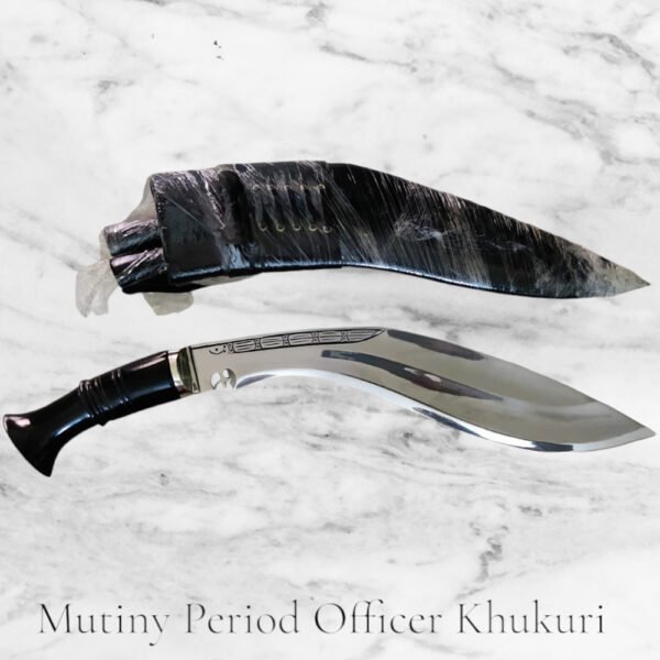 Indian Mutiny Officer Kukri placed on a stone, the blade is 13.5 inches long and it has a buffalo horn handle