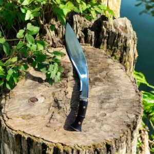 Mark 2 Kukri placed on tree log. Blade is made of 5160 steel