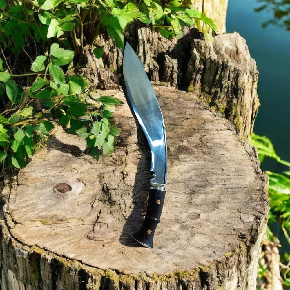 Mark 2 Kukri placed on tree log. Blade is made of 5160 steel