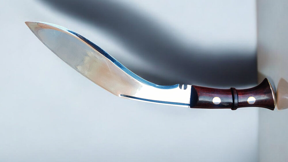 Mark 4 Kukri knife by himalayan blades chopping a wood.